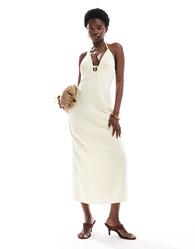Bershka linen blend halter midi dress with tie detail in yellow