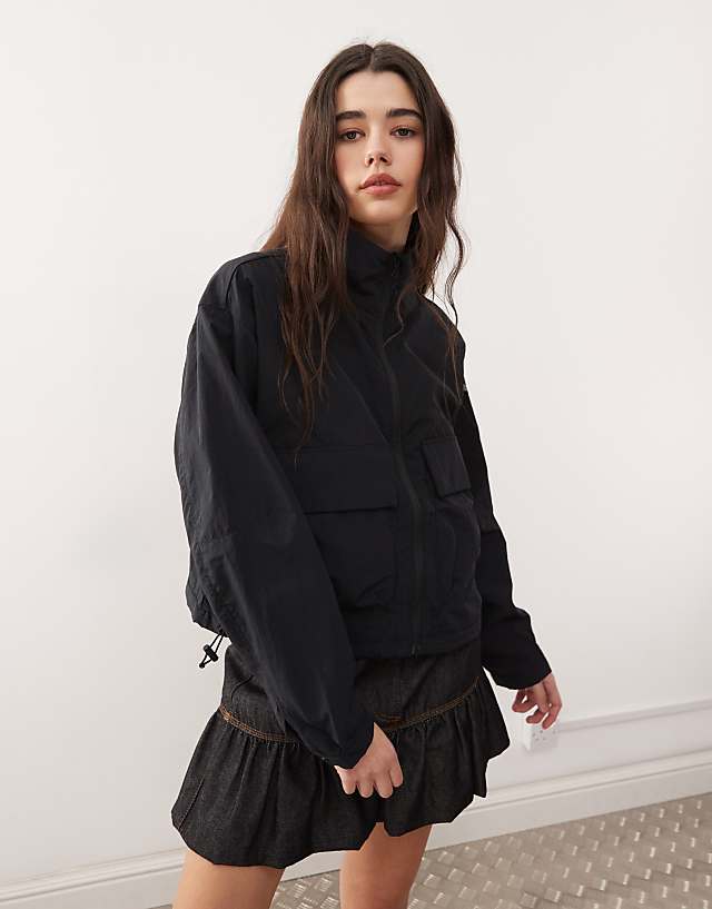 Columbia Paracutie cropped cargo windbreaker in black
