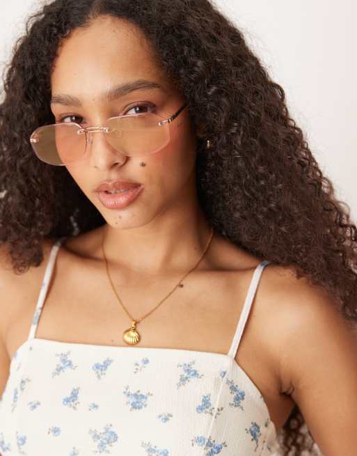 Jeepers Peepers Rimless Metal Oval Sunglasses In Pink And Gold