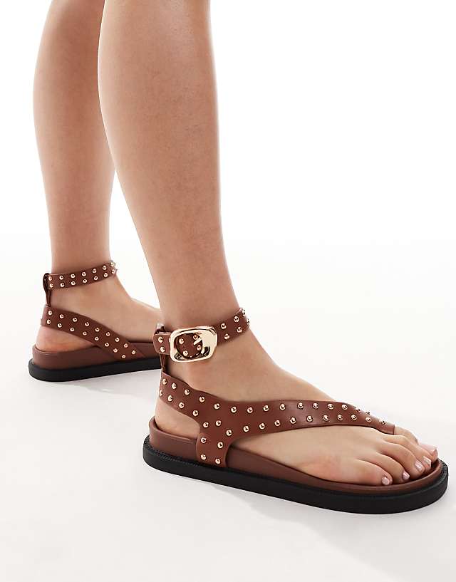 London Rebel flat stud toe loop sandals in tan