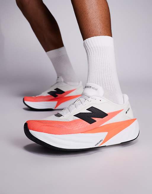 New Balance Fuelcell Rebel v5 running trainers in bright red and white