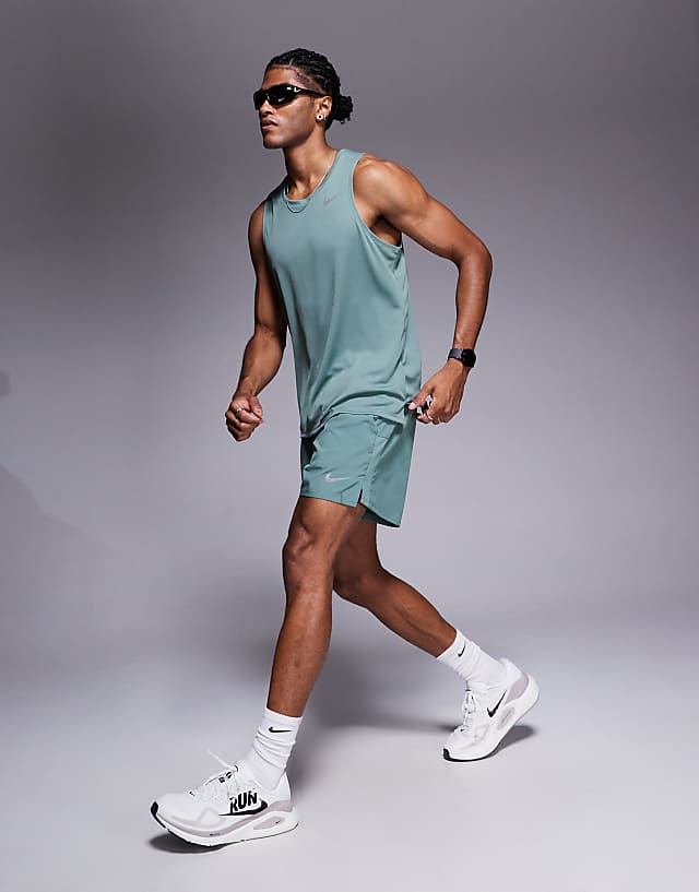 Nike Running Dri-FIT Challenger 5 inch shorts in green
