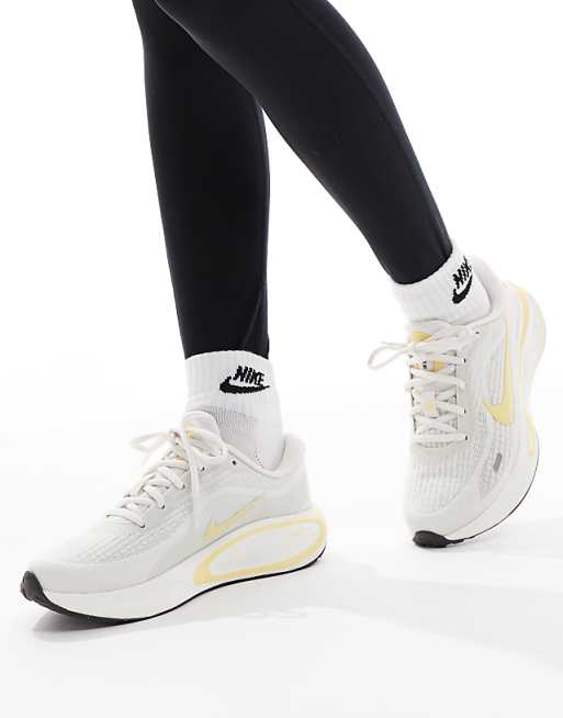 Nike Running Journey Run trainers in white and yellow