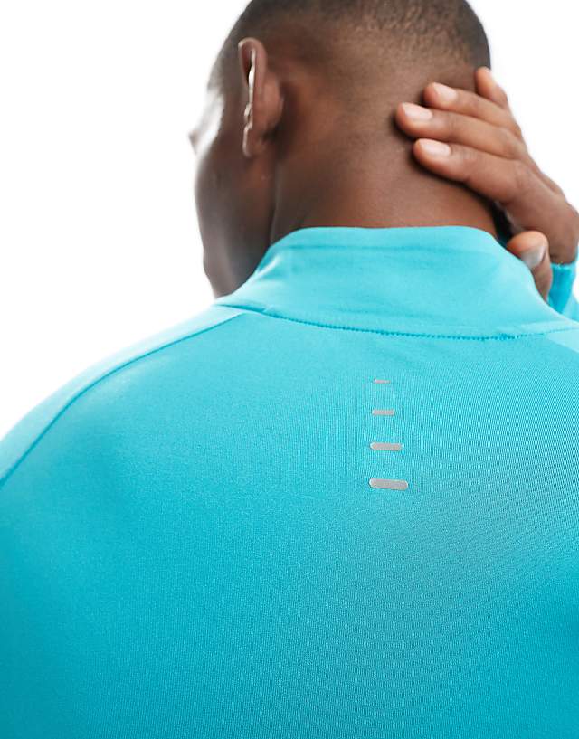 Nike Running Stride Dri-FIT Half Zip Longsleeve Top In Turquoise