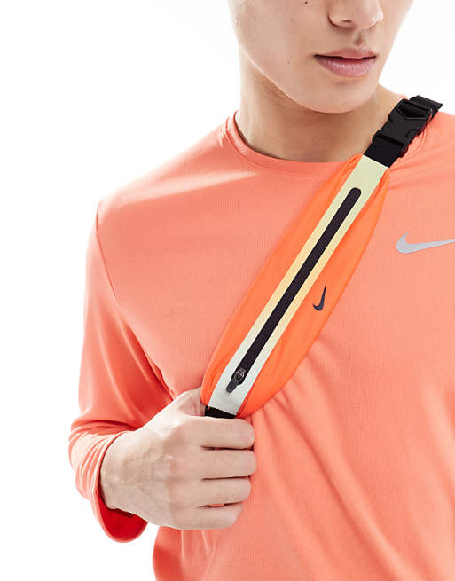 Nike slim waist pack 3.0 in bright crimson and cave purple