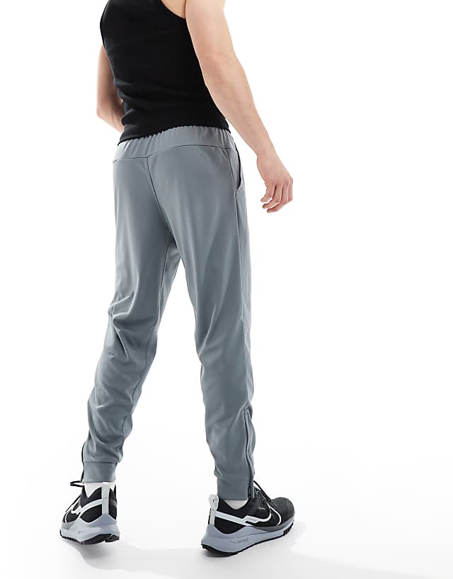 Nike Training Totality Dri-FIT Tapered Joggers In Grey