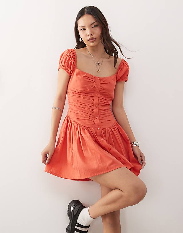 Reclaimed Vintage square neck dropped waist mini sun dress in tangerine red