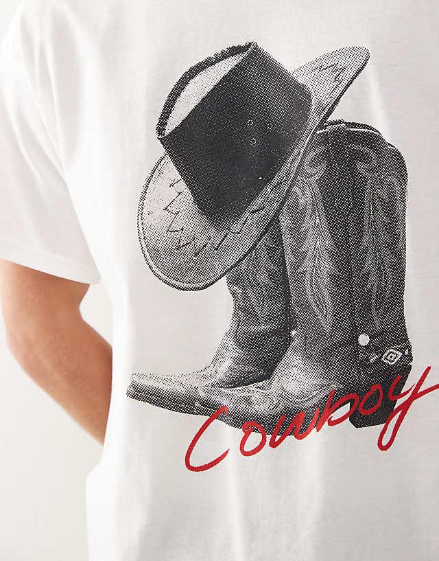 Reclaimed Vintage Unisex Oversized T-shirt With Cowboy Boot Print In White