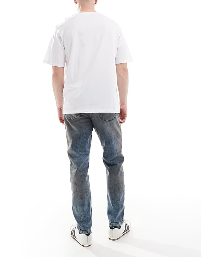 River Island Tapered Fit Jeans In Midwash Blue