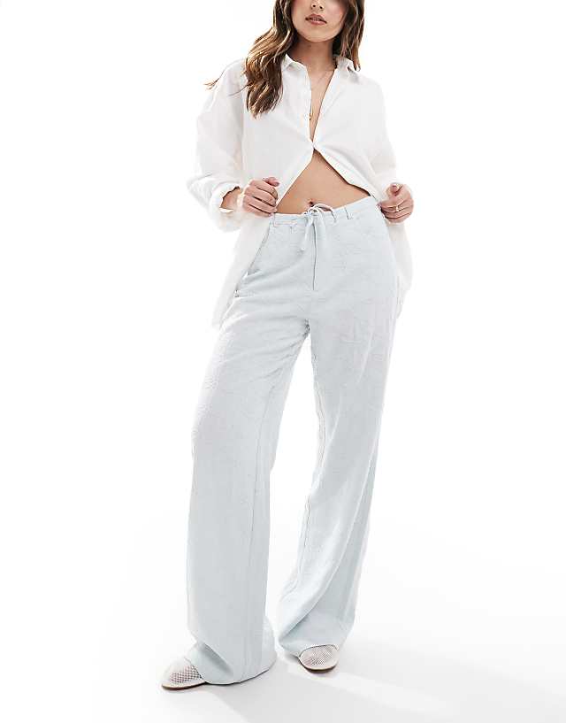Stradivarius linen look embroidery detail trouser in blue