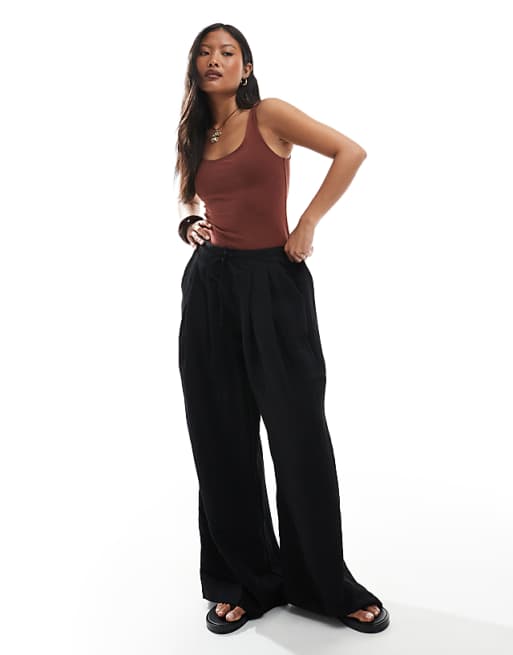 Stradivarius Petite wide leg crinkle tie waist trouser in black