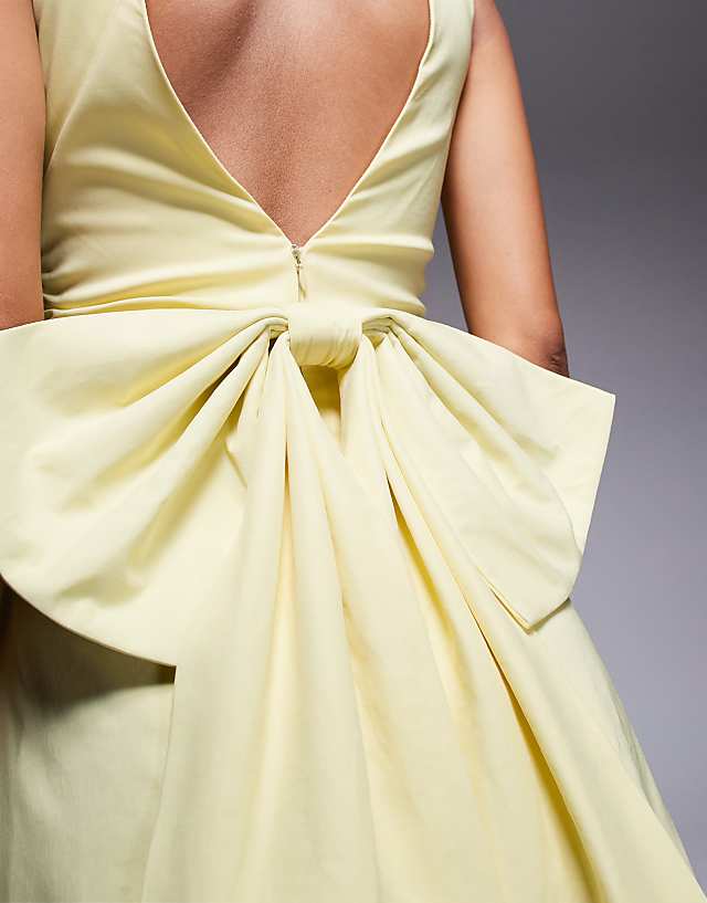 TFNC Structured Mini Dress In Bengaline With Bow Back Detail In Lemon