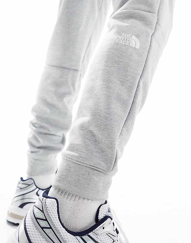 The North Face Training Reaxion Fleece Joggers In Grey