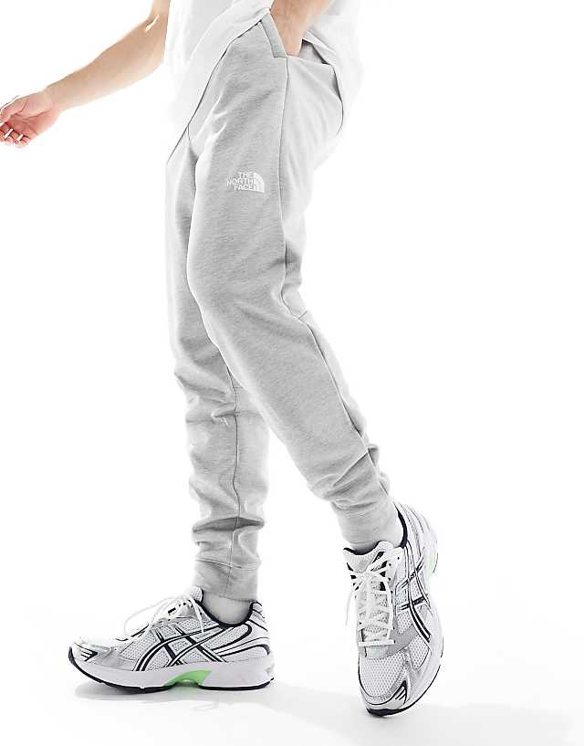 The North Face Training Reaxion Fleece Joggers In Grey