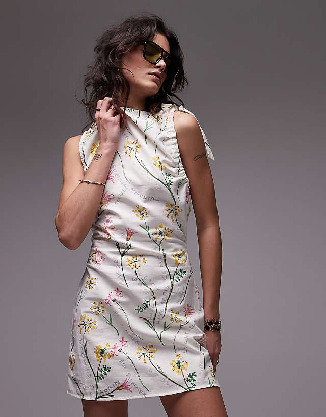 Topshop tie shoulder linen mini dress in flower head print