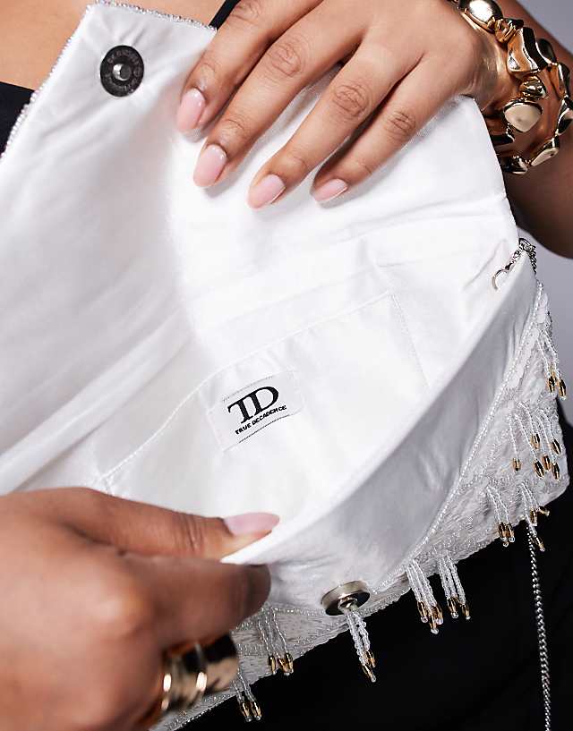 True Decadence 3D Embellished Envelope Clutch Bag With Crossbody Strap In White And Silver