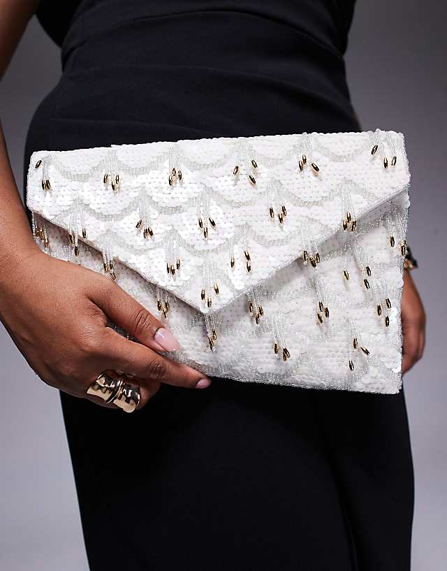 True Decadence 3D Embellished Envelope Clutch Bag With Crossbody Strap In White And Silver
