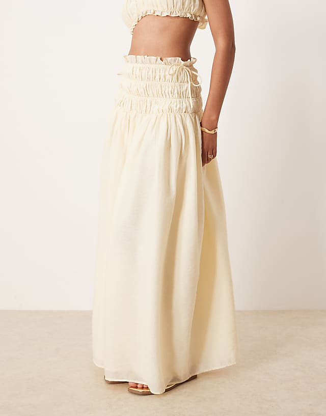 Wanderdoll Soulie Linen Look Shirred Dropped Waist Tie Detail Maxi Skirt Co-ord In Beige